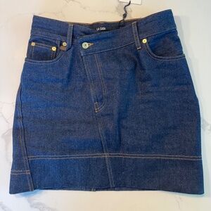 Jacquemus The de-Nîmes denim mini skirt LA CASA